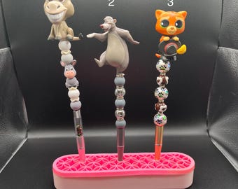 Bolígrafos con cuentas con temática de personajes icónicos