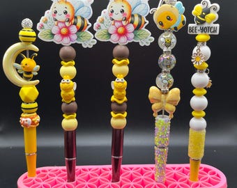 Bolígrafos con cuentas de abeja