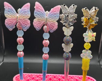 Bolígrafos con cuentas de mariposas