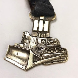 Vintage Mid Century I. H. International Harvester Bulldozer Brass Watch Fob Green Duck Co. Hallmarked with Original Strap
