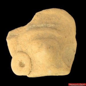 May include: A small, light brown clay figurine of a person with a wheel. The figurine is about 2 inches tall and has a simple, rounded shape.