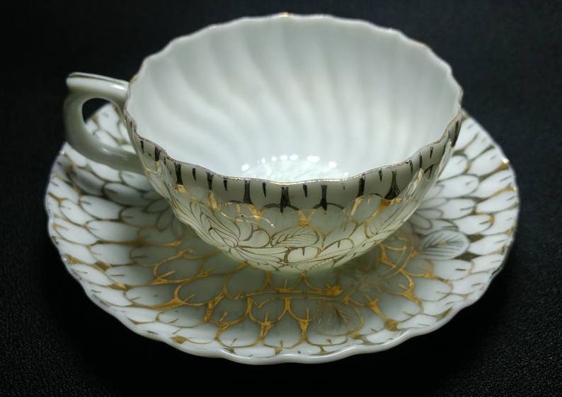 Translucent China Cup and Saucer Beautiful Swirled Fluted Pattern Design is all Gilding Unmarked 3 Dia Cup Ref 19516