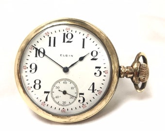 1919 Illinois Grado 386 16s 17j Reloj de bolsillo Elgin en Nueva York Caja con garantía de 30 años Movimiento en relieve Palanca de caza Buen equilibrio