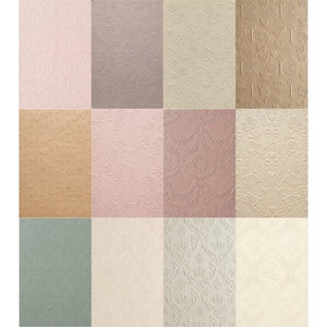 May include: A grid of twelve patterned papers in various colors. The patterns include floral, heart, key, and crown designs. Colors range from light pink and beige to brown and green. The papers have a textured, embossed appearance.