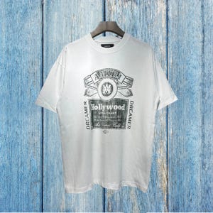 Camiseta Amiri, camiseta Amiri Premium, cuello redondo de algodón de moda, camisetas casuales de hip-hop Amiri, estampado de letras