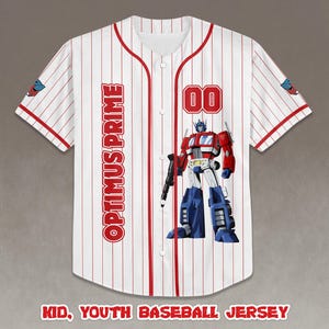 May include: White baseball jersey with red pinstripes, featuring "OPTIMUS PRIME" in red block letters and the number "00". A graphic of Optimus Prime is on the front. The text "KID, YOUTH BASEBALL JERSEY" is at the bottom.