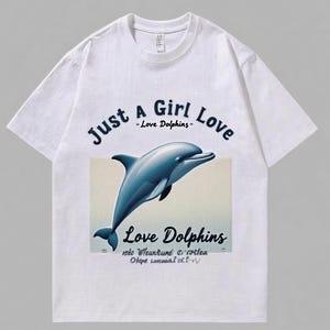 イルカが大好きな女の子のTシャツ - かわいい海の動物のグラフィックTシャツ - 女性と女の子へのイルカ好きへのギフト - 海洋生物Tシャツ