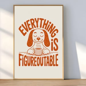 Op de afbeelding: Een ingelijste print met een cartoonhond die een mok vasthoudt, met de oranje tekst "EVERYTHING IS FIGUREOUTABLE". De hond heeft gesloten ogen en stoom komt uit de mok. De achtergrond is gebroken wit en de lijst is goudkleurig.