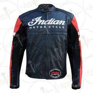 May include: A navy blue leather motorcycle jacket with red and white accents. The jacket features the words "Indian MOTORCYCLE" in white across the chest and a circular patch with text. The jacket has a stand-up collar and zippered sleeves.