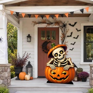 May include: A decorative Halloween yard sign featuring a cartoon skeleton emerging from a large, orange jack-o'-lantern. The skeleton wears a pumpkin-shaped hat, and the jack-o'-lantern has a carved, grinning face with glowing yellow eyes.