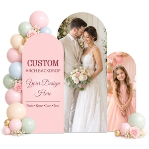 May include: A custom arch backdrop display featuring a pink panel with the text CUSTOM ARCH BACKDROP, Your Design Here, and Photo Name Date Text. The display is decorated with a balloon garland in pastel pink, blue, green, and cream colors.