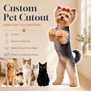 May include: Custom pet cutout made from a pet photo, featuring a life-size standing Yorkshire Terrier with a red bow, alongside smaller foam board cutouts of a golden retriever, a corgi, a calico cat, a ragdoll cat, and a black cat on a floor.