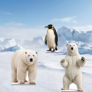 May include: Three animal cutouts: a penguin with black and white feathers and a yellow patch, and two polar bears. One polar bear stands on all fours, and the other stands upright with its paws raised. The background shows a snowy landscape with ice formations.
