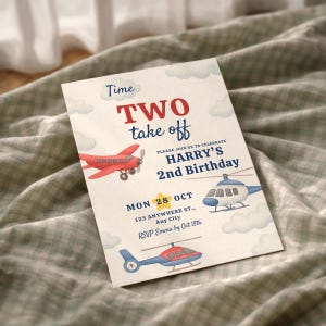 May include: A cream-colored invitation card with the text "Time TWO take off" and illustrations of an airplane and helicopters. The card reads "HARRY'S 2nd Birthday" and includes the date, address, and RSVP information.