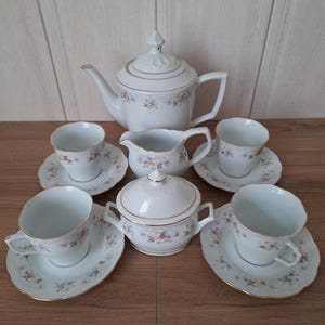Juego de té vintage de porcelana con diseño floral para 4 personas, con detalles dorados, importado de la URSS