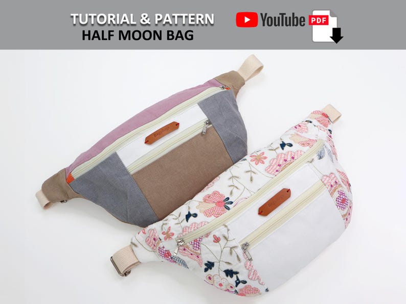 May include: Two half-moon shaped bags. One is made of a patchwork of pink, gray, and brown fabric. The other is white with a floral pattern and a brown leather zipper pull. Both bags have a zipper closure and a strap.