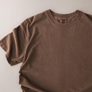 Elegant mockup collection of the Comfort Colors 1717 in on a soft ivory background.