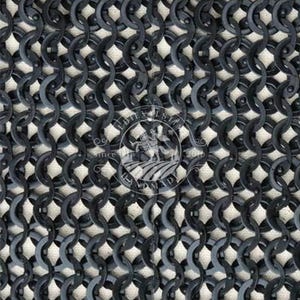 May include: Close-up of a section of chainmail armour. The interlocking metal rings are dark grey, creating a textured pattern. The background is a light, off-white colour. A circular logo with text and a knight on a horse is visible.