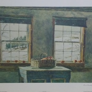 May include: A watercolor painting depicts two windows overlooking a snowy landscape. A woven basket filled with apples sits atop a blue cabinet. Apples are also placed on the windowsill. The scene evokes a sense of tranquility and rural life.