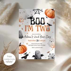 May include: A Halloween-themed invitation with the text "BOO I'M TWO" and "Adam's 2nd Boo-Day." The design includes cartoon ghosts, pumpkins, bats, and spiderwebs. The invitation also includes the date, time, and location of the event.