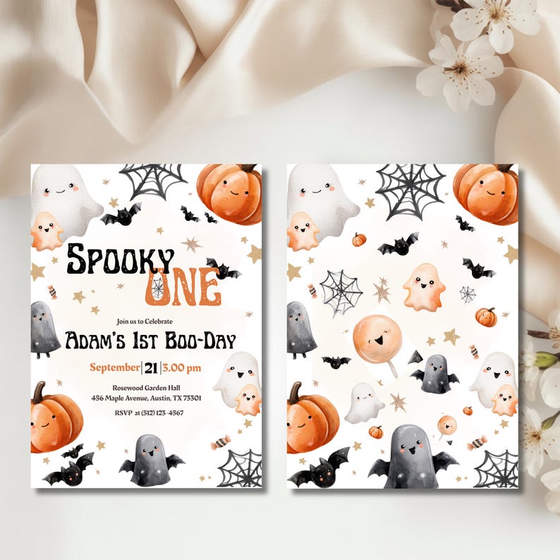 May include: Halloween party invitation with the text "SPOOKY ONE" and "ADAM'S 1ST BOO-DAY". The design features cartoon ghosts, pumpkins, bats, and spiderwebs in orange, black, and white. Includes event details.