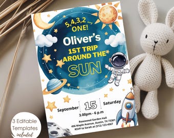 May include: A space-themed birthday invitation with the text "Oliver's 1st Trip Around the Sun." The design includes an astronaut, rocket, planets, and stars. The invitation is white with a blue and yellow color scheme.