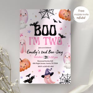 May include: A pink Halloween-themed invitation with the text "BOO I'M TWO" and "Emely's 2nd Boo-Day". The design includes ghosts, bats, pumpkins, and spiderwebs. The invitation also includes the date, time, and location.