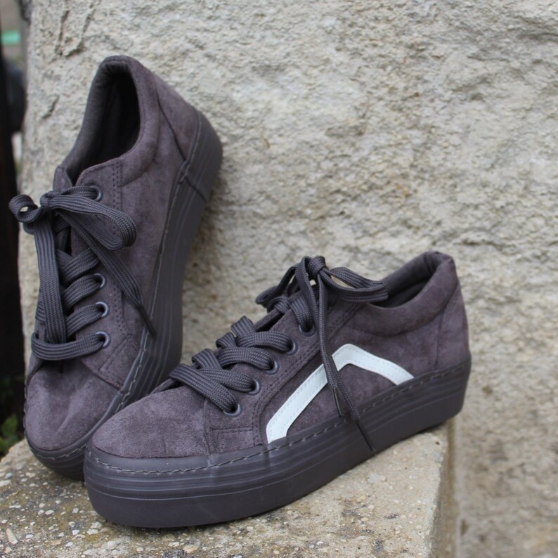 grey color sneakers