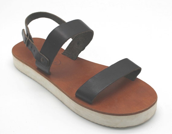 white leather flatforms