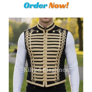 May include: A black vest with gold detailing and buttons, in a military style. The vest has a high collar and decorative gold accents. The text "Order Now!" is displayed at the top of the image, and the text "Kilted Elegance" is displayed at the bottom.