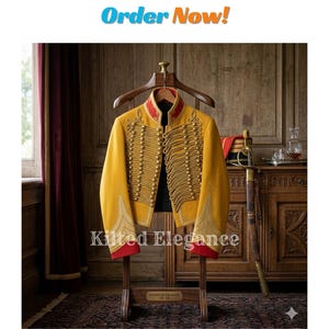 May include: A mustard yellow military jacket with gold detailing and red accents is displayed on a wooden hanger. The jacket is on a wooden stand in front of a wooden cabinet. The text "Order Now!" is at the top.
