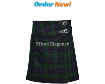 May include: A green and navy plaid kilt with two black leather straps and buckles. The kilt has the text "Kilted Elegance" on it, and the words "Order Now!" in blue and orange.