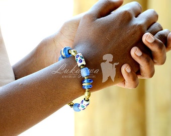Multi-colored single strand  beaded Afrocentric bracelet Custom African beaded bracelets for women