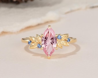 Op blad geïnspireerd vuurwerk gesneden roze saffier marquise verlovingsring ronde korenbloem blauwe saffier band geelgouden unieke bruidsring cadeau