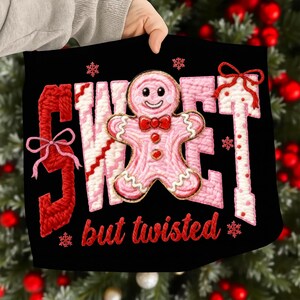 May include: Black square Christmas-themed design with the words "SWEET but twisted" in red and pink. A pink gingerbread man with a red bow tie is in the center. Red bows and snowflakes are also featured in the design.