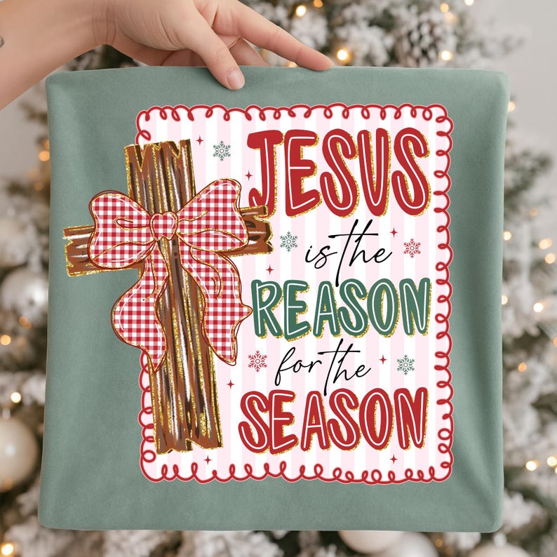 May include: A decorative pillow with the text "JESUS is the REASON for the SEASON." The design includes a cross with a red and white gingham bow. The background is a light green color.