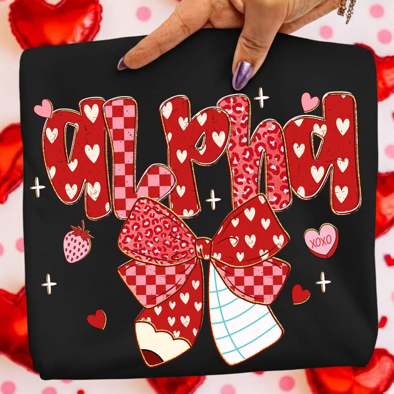 May include: Black sweatshirt with the word "ALPHAD" in red, with heart and leopard print patterns. A large bow with a pencil design and the text "XOXO" is featured. Small hearts and strawberries are also present.