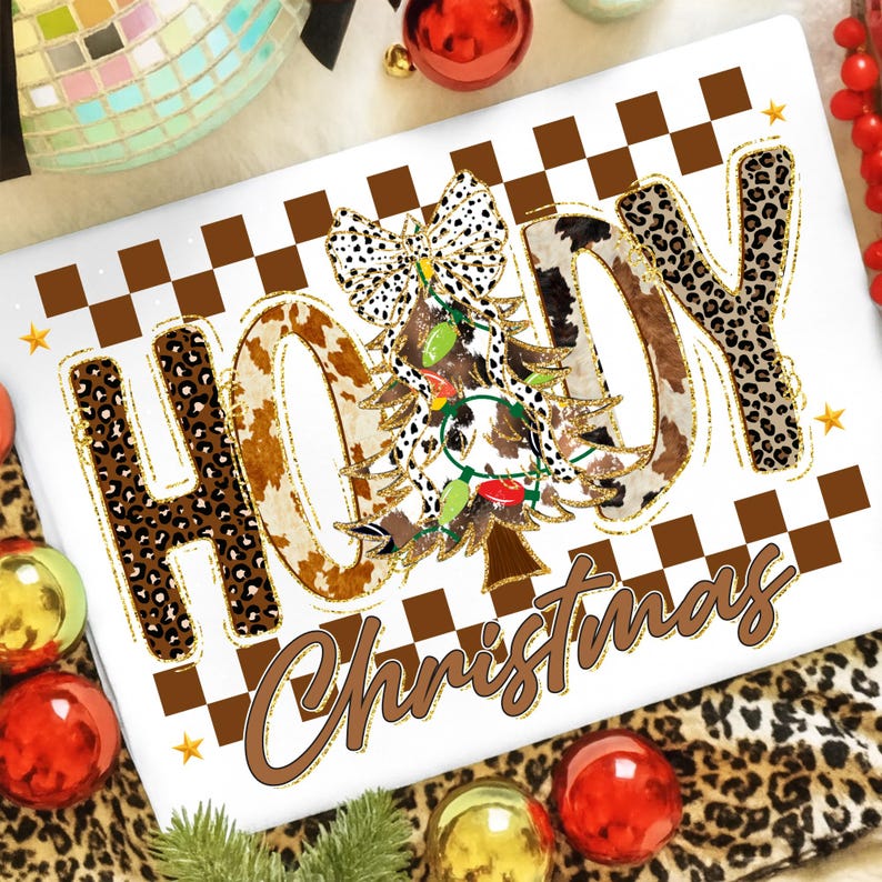 May include: White Christmas-themed design with the word "HOODY" in a mix of leopard and cow print, and "Christmas" in a brown script. A Christmas tree with a cow print design is in the center, adorned with a bow and lights.