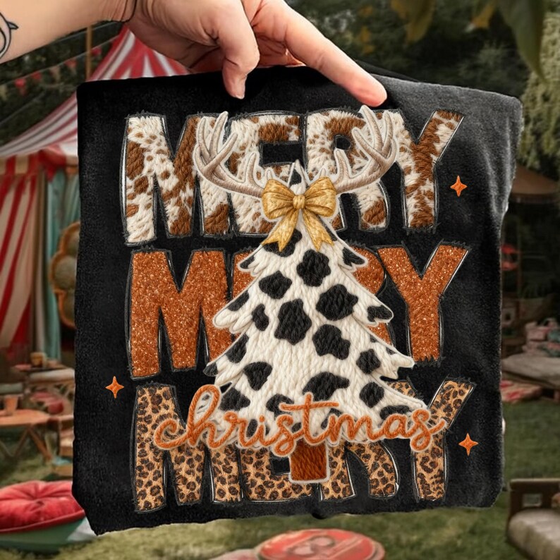 May include: Black Christmas-themed graphic with the words "Merry Christmas" in a mix of fonts and textures. The word "Merry" is in a cowhide pattern, and the Christmas tree is in a black and white cowhide pattern. A gold bow sits atop the tree.