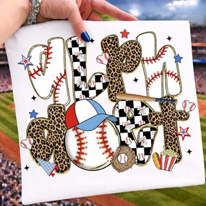 May include: White baseball-themed graphic with the words "Baseball Mom" in a playful font. The design includes baseballs, a baseball cap, a bat, and stars. The letters have a mix of leopard print, baseball stitching, and checkered patterns.