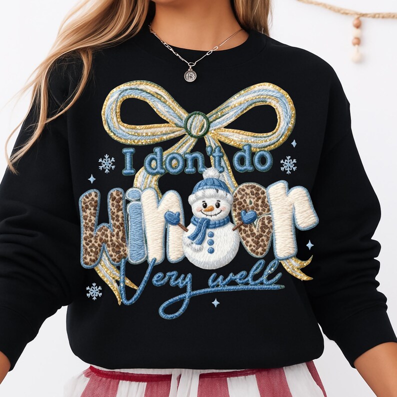 May include: Black sweatshirt with the text "I don't do winter very well." The design includes a snowman, a bow, and snowflakes. The word "winter" has a leopard print pattern.