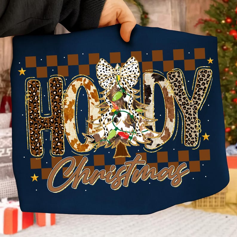 May include: Navy blue Christmas-themed design featuring the words "HO HOY Christmas" in a mix of leopard and cow print. A Christmas tree with lights and a bow is in the center. Brown and gold accents with a checkered pattern.