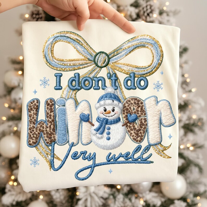 May include: Cream-colored sweatshirt with an embroidered design. The design features a snowman wearing a blue hat and scarf, with the text "I don't do winter very well." The word "winter" has a leopard print pattern.