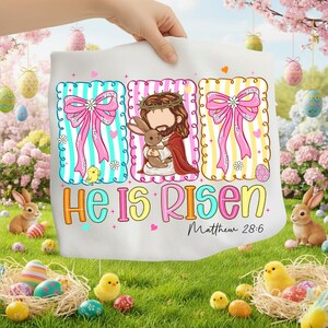 May include: White Easter graphic with three panels: pink bow, Jesus with a bunny, and the text "He Is Risen" with "Matthew 28:6". The design includes Easter eggs, chicks, and floral elements, perfect for Easter celebrations.