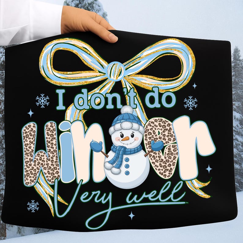 May include: Black tote bag featuring a snowman graphic and the phrase "I don't do winter very well." The design includes a blue and gold bow, snowflakes, and leopard print lettering. A fun winter-themed accessory.
