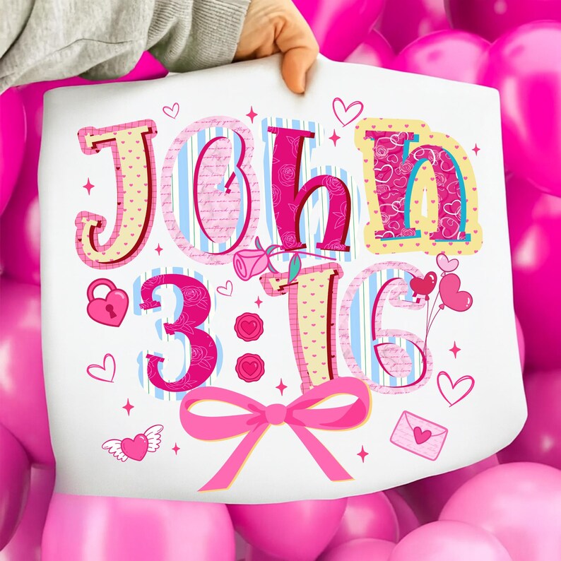 May include: A white print with the words "JOHN 3:16" in a decorative font. The design incorporates hearts, a bow, and other romantic elements. The background features pink and blue stripes, creating a vibrant aesthetic.