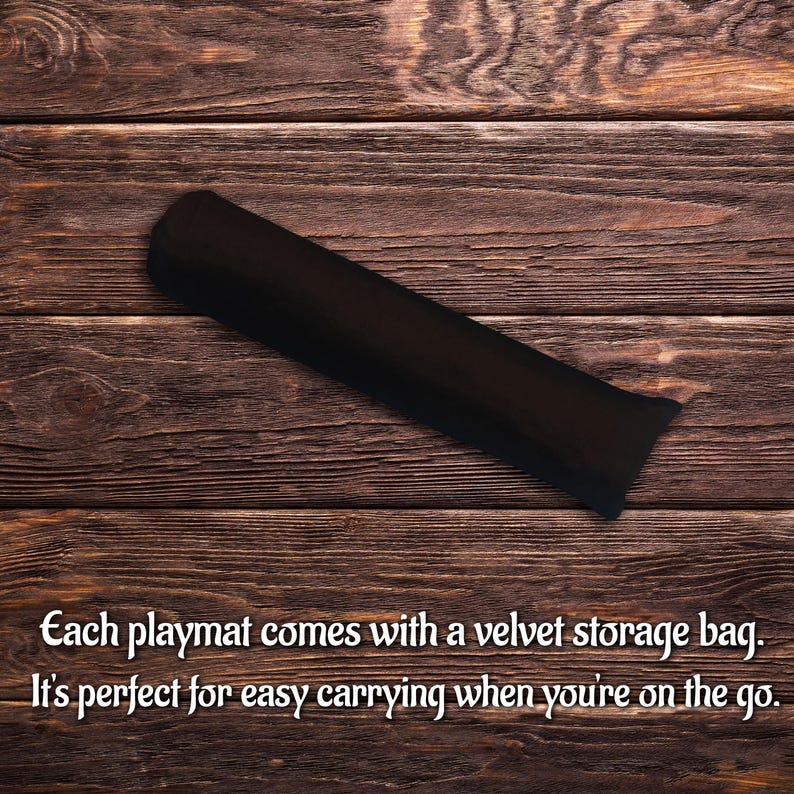 May include: A rolled-up black playmat on a wooden surface. The playmat comes with a velvet storage bag for easy carrying. The text on the image says, "Each playmat comes with a velvet storage bag. It's perfect for easy carrying when you're on the go."