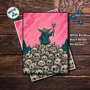 mtg card sleeves a tiny goblin stands proudly atop a mountain of skulls, raising a skull-topped staff against a vivid pink sky.