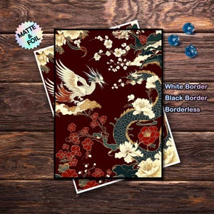 May include: A print featuring a phoenix and dragon design with floral accents on a burgundy background. The print has a white border, black border, and borderless options. The text "MATTE & FOIL" is visible.