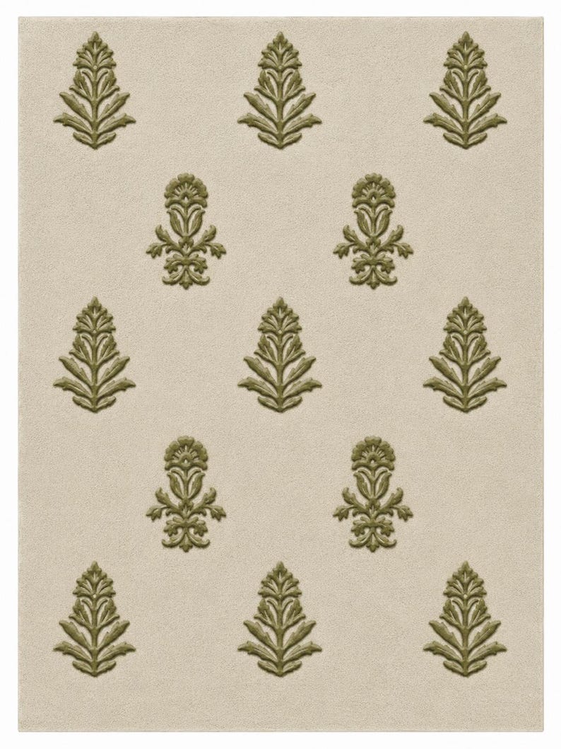 May include: A rectangular area rug featuring a light beige background with a repeating pattern of olive green botanical motifs. The design consists of alternating stylized leaf and floral shapes arranged in a symmetrical grid across the surface.